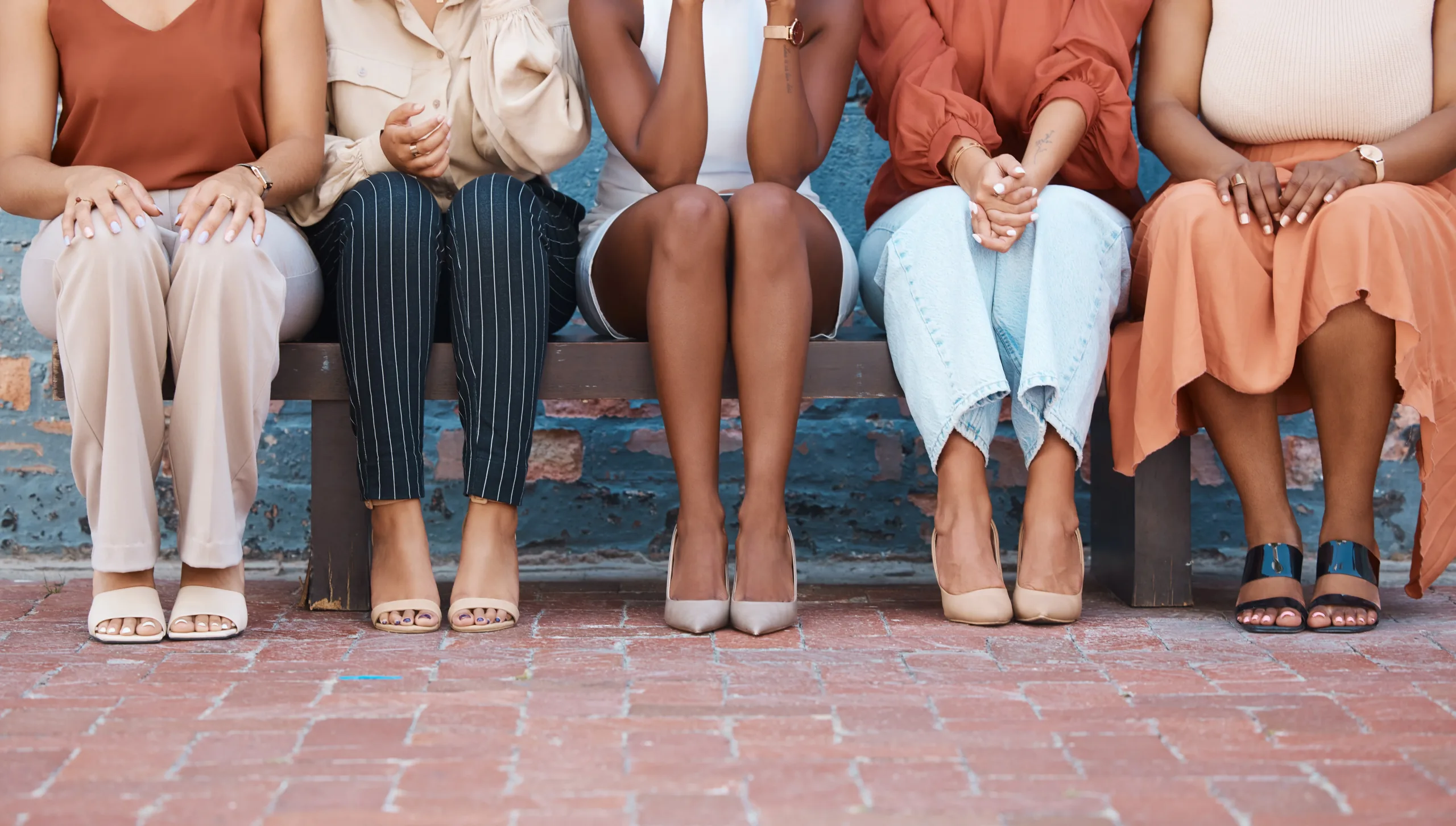 group-of-five-formal-businesswomen-sitting-on-a-be-2026-01-09-10-57-45-utc